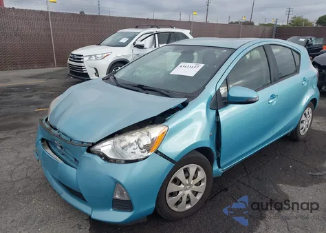 2014 Toyota Prius C Two z USA, uszkodzony, nr VIN JTDKDTB37E1074085